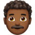 苹果系统里的男士：中深色肤色，卷发emoji表情